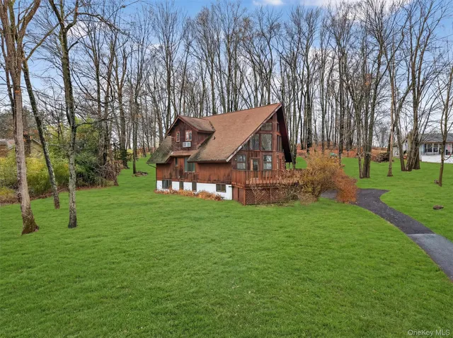 a view of a house with a park