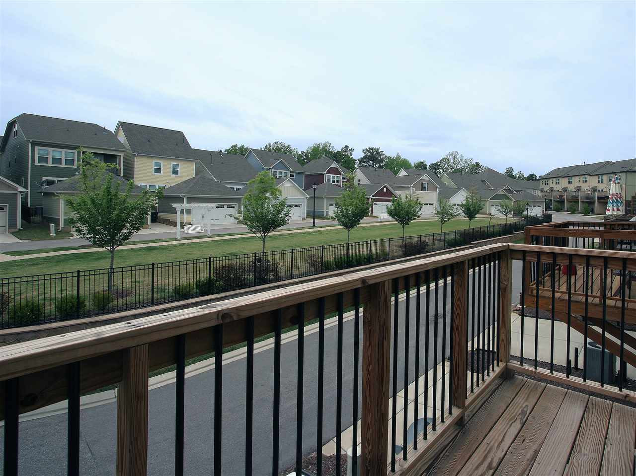 1517 Rodessa Run Raleigh, NC 27607 - Photo 18 of 25 Deck, off the living room, overlooks one of the neighborhood greenspaces. Deck