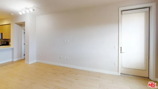 an empty room with a bathroom
