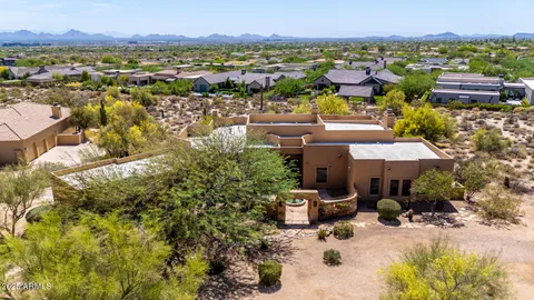 a view of a city with lawn chairs