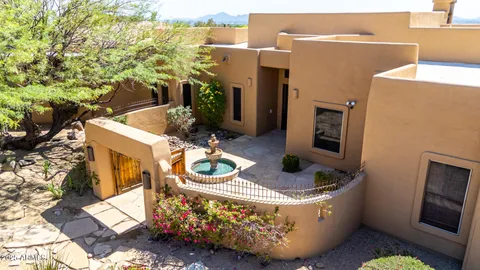 a table and chairs in the patio