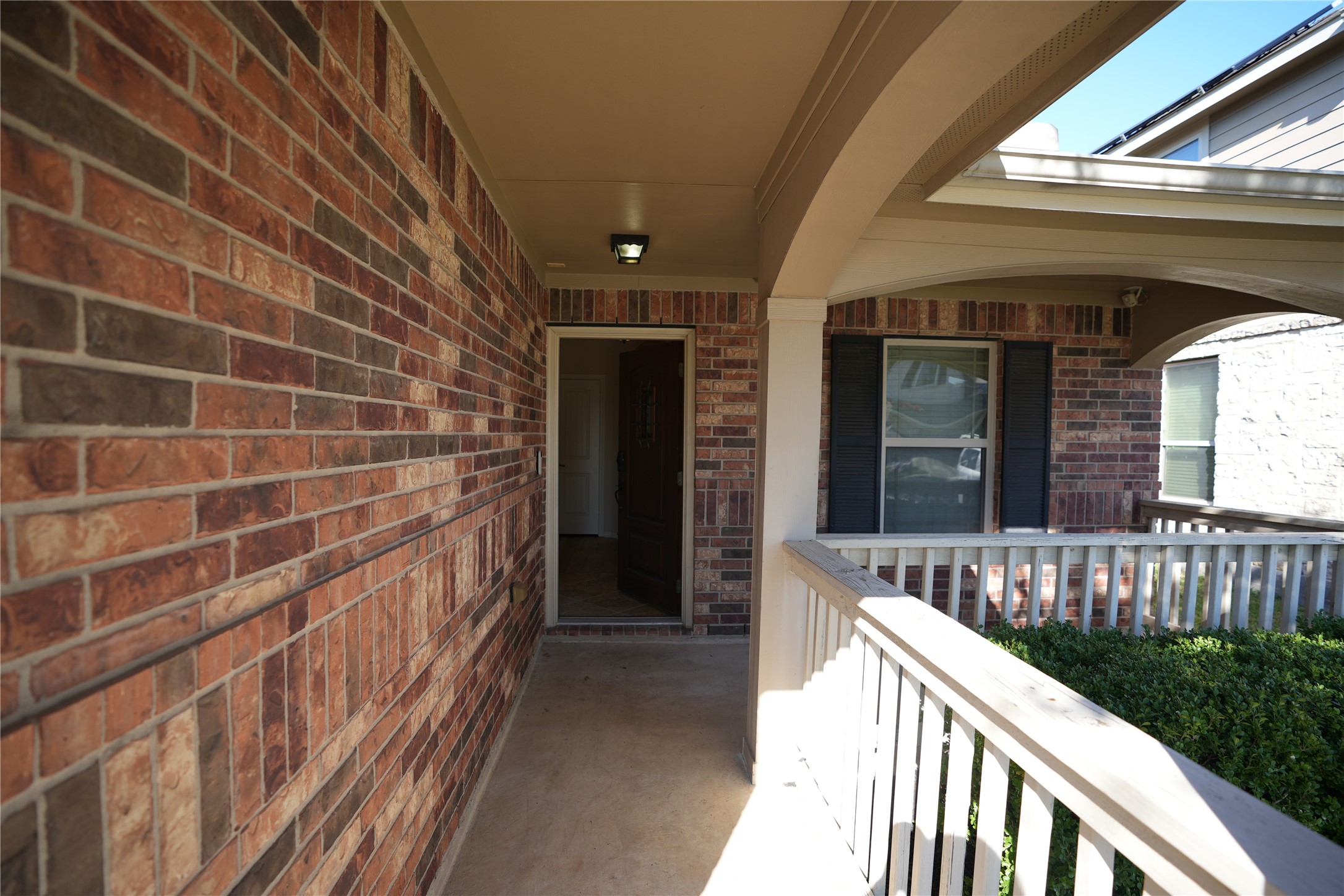 1710 Thornhampton Court Houston, TX 77014 - Photo 2 of 17 a view of a house with a porch