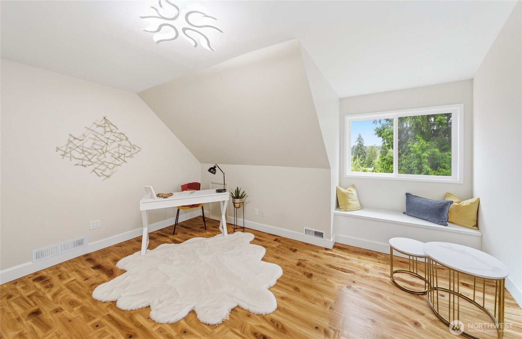 412 164th Place Southeast Bothell, WA 98012 - Photo 23 of 39 a bedroom with a bed and wooden floor