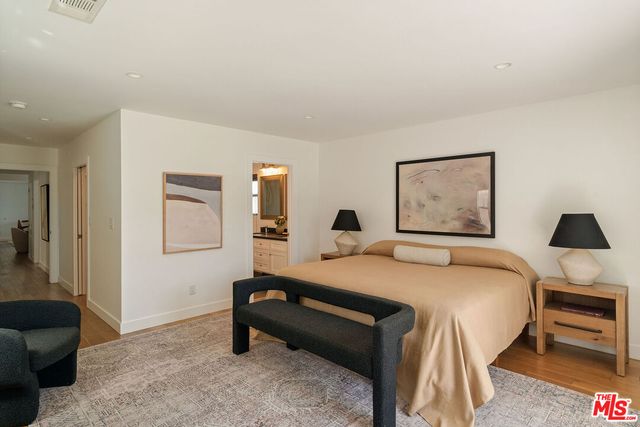 a living room with a couch and a large window