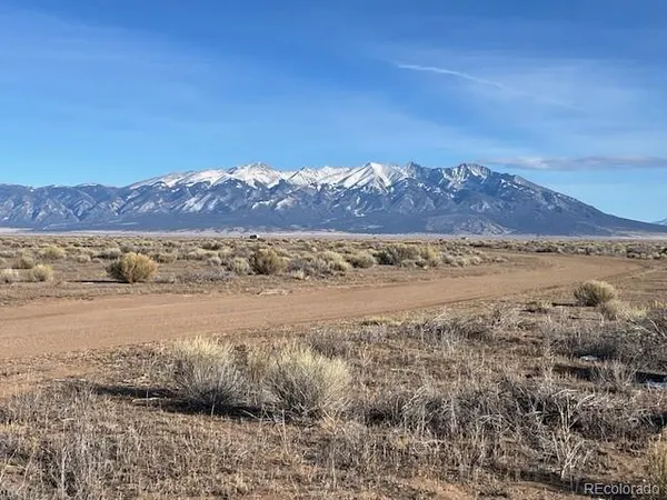 a view of ocean and mountain