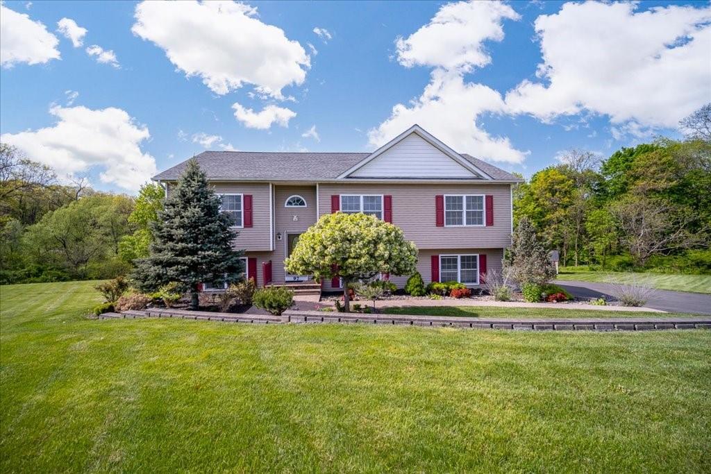Beautiful Home set back from the road with plenty of yard space in front.