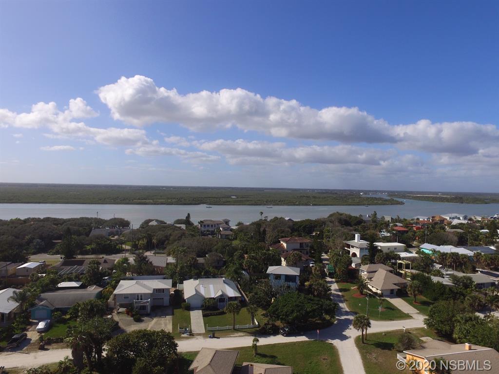 405 Tide Street New Smyrna Beach, FL 32169 - Photo 31 of 33 an aerial view of a city