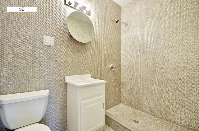 a view of a kitchen with a sink
