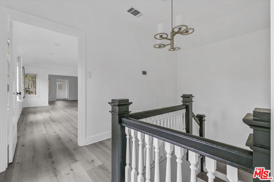 5112 Edgewood Place Los Angeles, CA 90019 - Photo 9 of 21 a view of a hallway with a small space