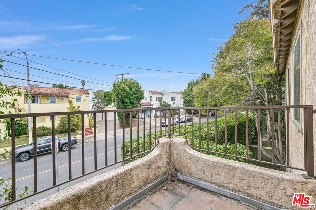 5112 Edgewood Place Los Angeles, CA 90019 - Photo 10 of 21 a view of a two chairs in the balcony