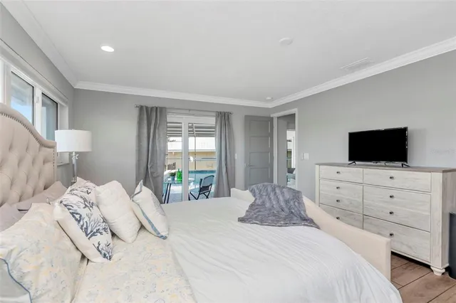 a view of a swimming pool with outdoor seating