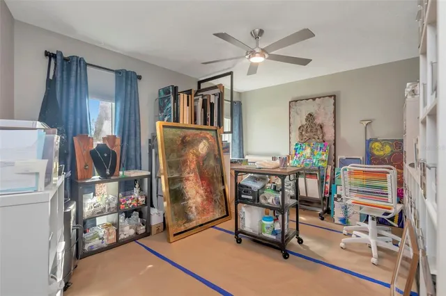 an aerial view of a house with a lake view