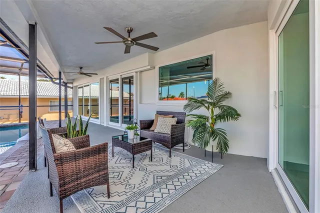 an aerial view of a city with lots of residential buildings lake and ocean view