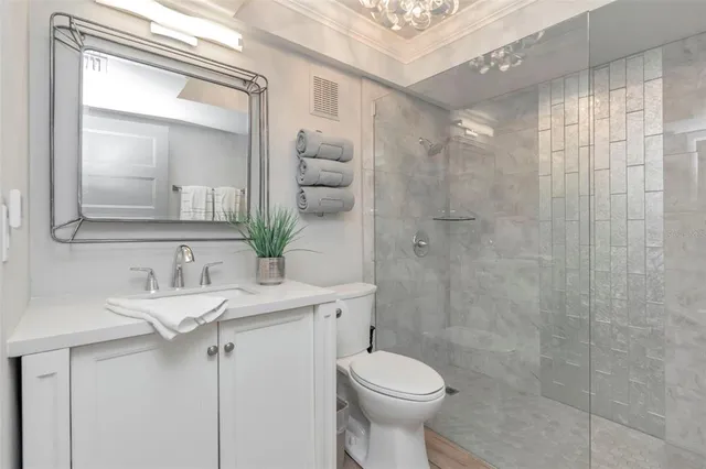 a living room with fireplace furniture and a flat screen tv