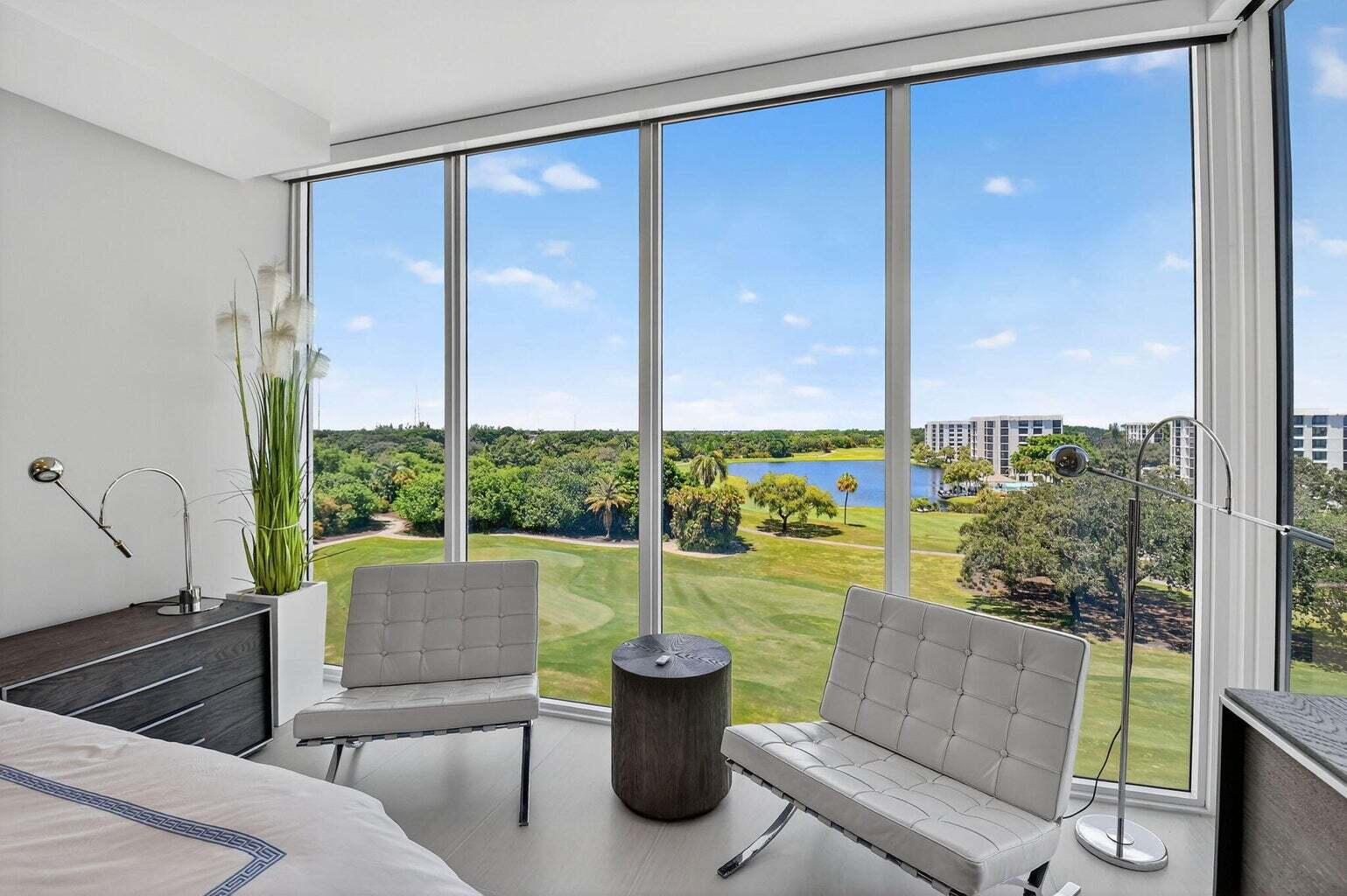 20155 Boca W Drive, Unit C504 Boca Raton, FL 33434 - Photo 10 of 42 a view of a living room and floor to ceiling window or tub