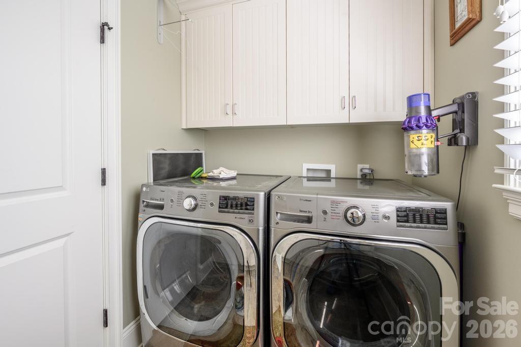 7315 Bay Ridge Drive Denver, NC 28037 - Photo 22 of 39 a utility room with dryer and washer