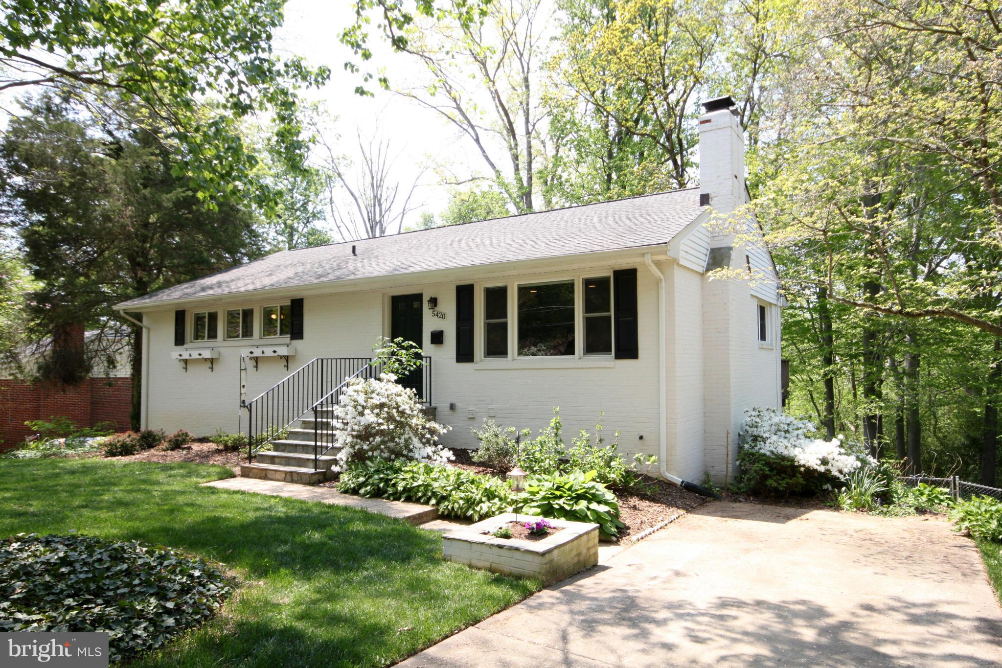 5420 Inverchapel Road Springfield, VA 22151 - Photo 1 of 29 a front view of a house with a yard