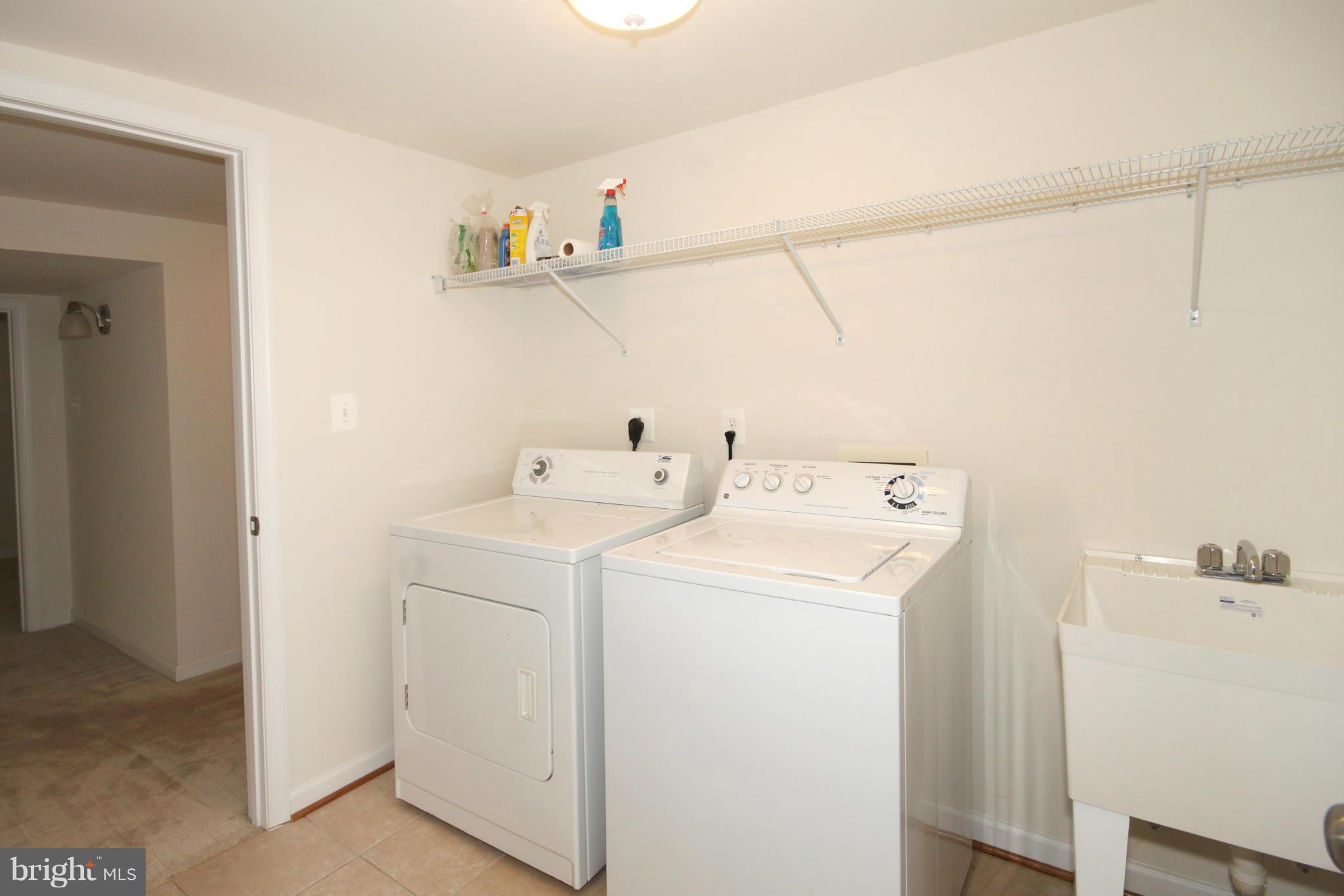 5420 Inverchapel Road Springfield, VA 22151 - Photo 22 of 29 a utility room with dryer and washer