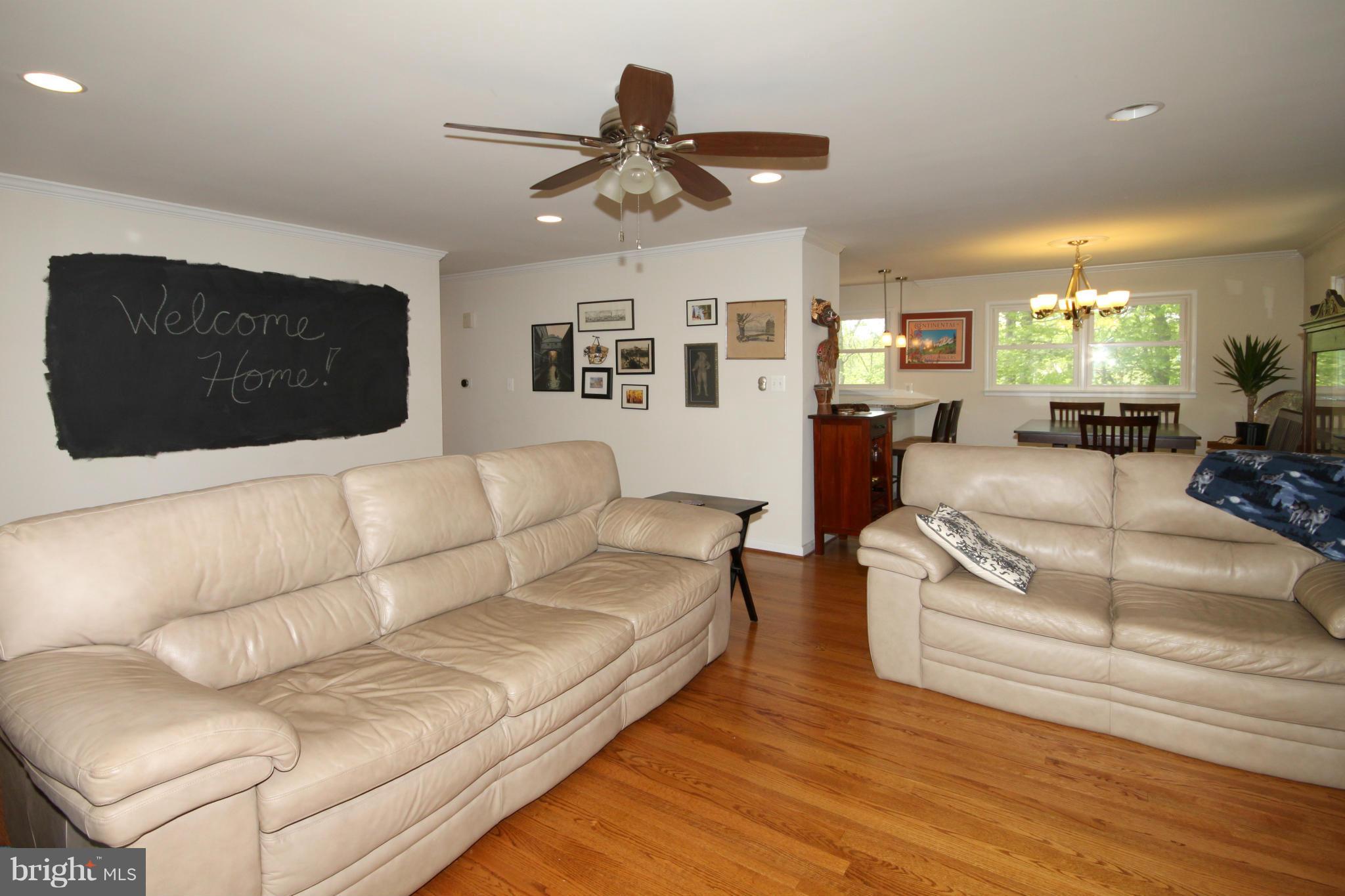5420 Inverchapel Road Springfield, VA 22151 - Photo 4 of 29 a living room with furniture and a flat screen tv