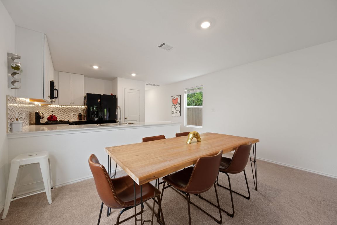 68 Trinity Circle Lockhart, TX 78644 - Photo 12 of 27 a view of a dining room with furniture