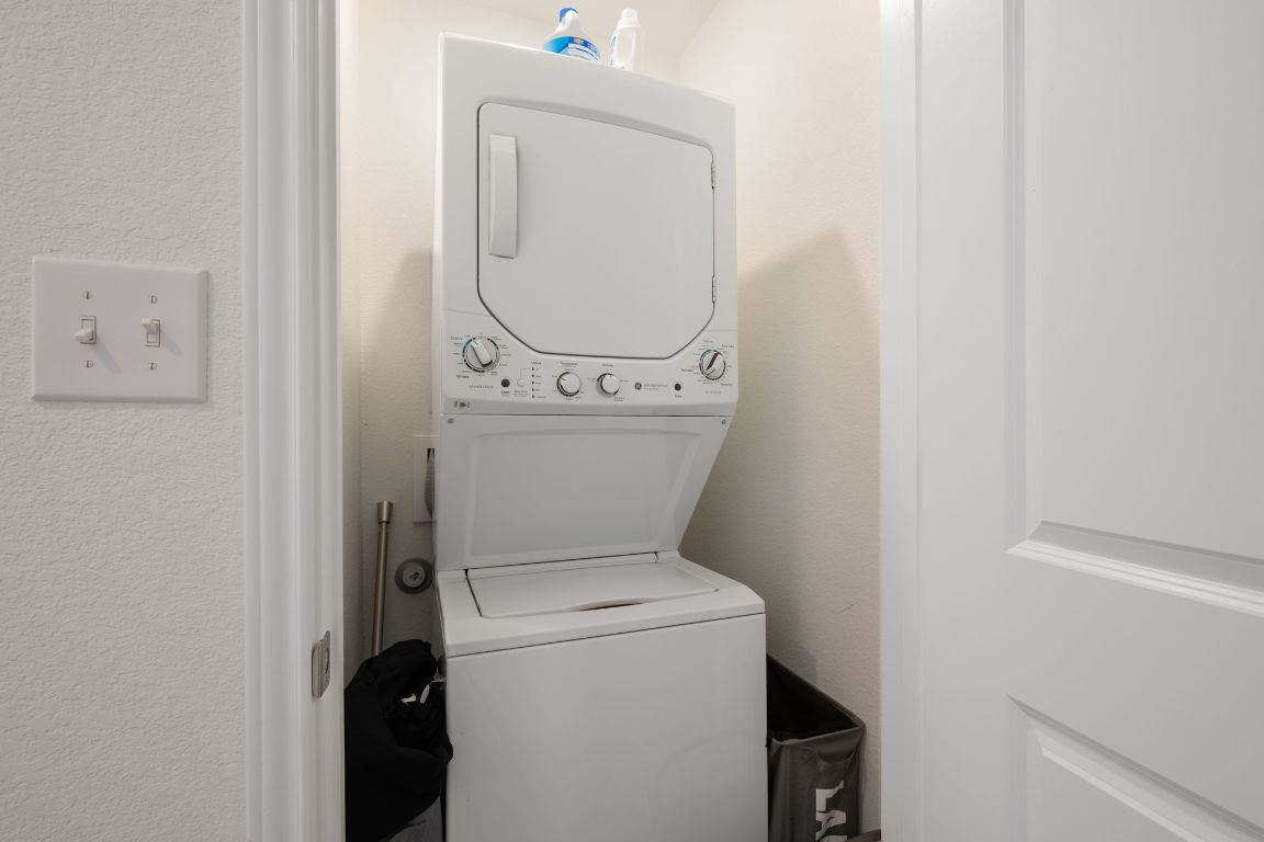 68 Trinity Circle Lockhart, TX 78644 - Photo 21 of 27 a utility room with dryer and washer