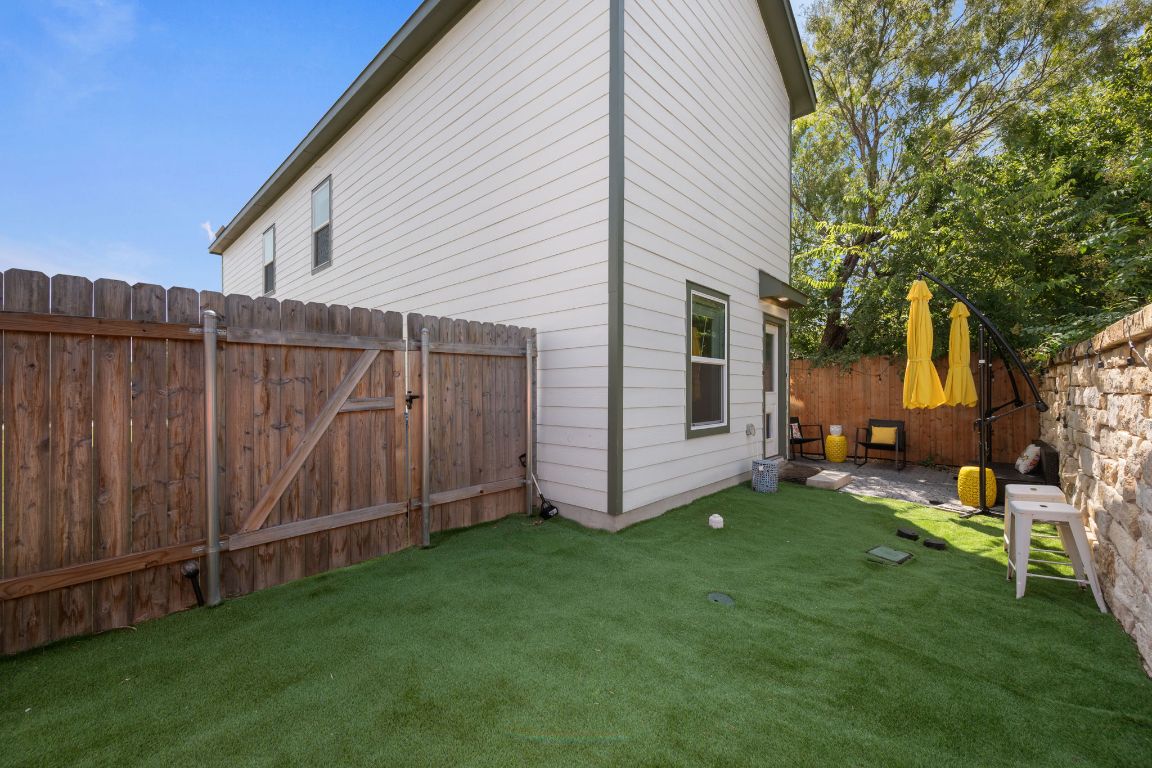 68 Trinity Circle Lockhart, TX 78644 - Photo 23 of 27 a view of a back yard of the house