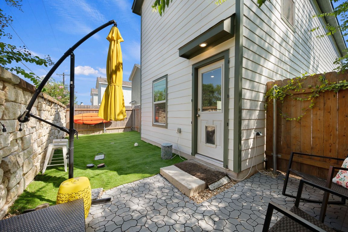 68 Trinity Circle Lockhart, TX 78644 - Photo 25 of 27 a view of a house with backyard and sitting area