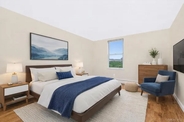 a bedroom with a bed and a couch