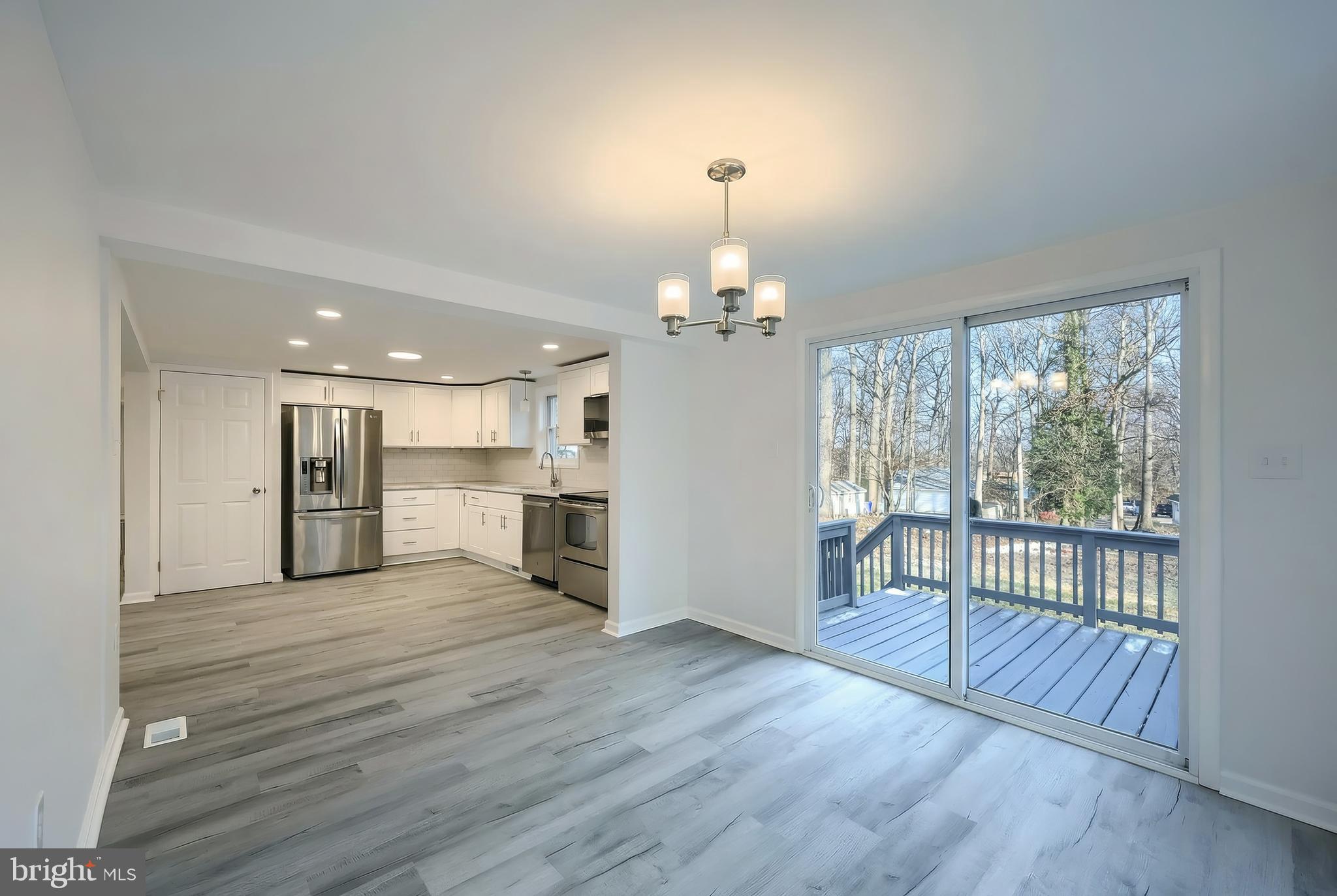 287 Chestnut Hill Road York, PA 17402 - Photo 13 of 36 a view of a kitchen with wooden floor and a sink