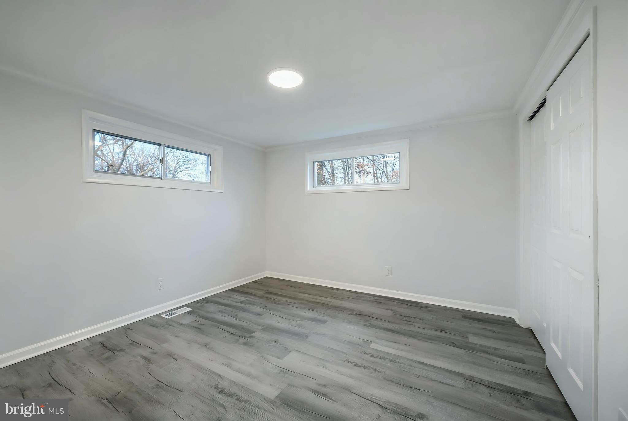 287 Chestnut Hill Road York, PA 17402 - Photo 22 of 36 a view of a room that has wooden floor and window