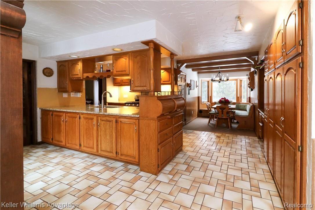 4679 Hegel Road Goodrich, MI 48438 - Photo 13 of 41 Large kitchen has an abundance of cabinet space!