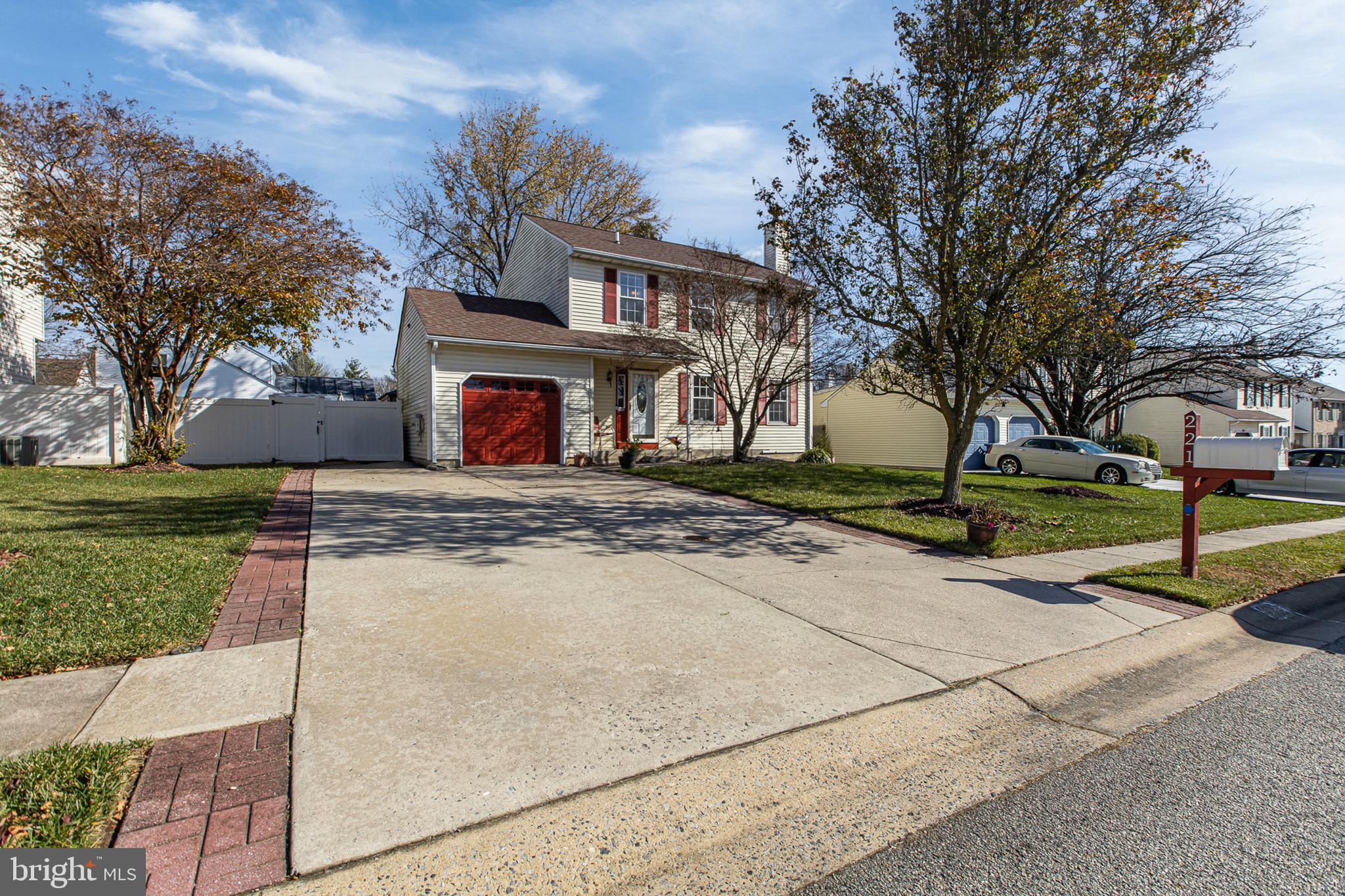 221 Romeo Drive New Castle, DE 19720 - Photo 2 of 38 a front view of a house with a yard
