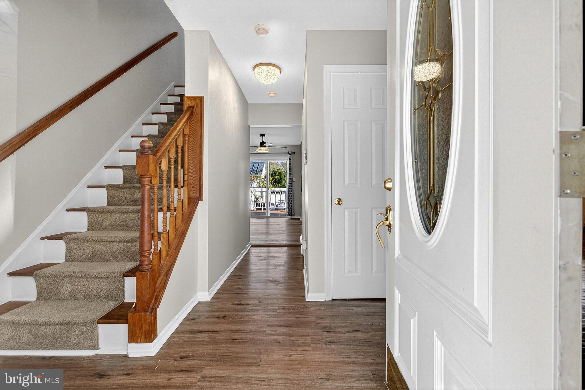 221 Romeo Drive New Castle, DE 19720 - Photo 6 of 38 a view of an entryway with wooden floor