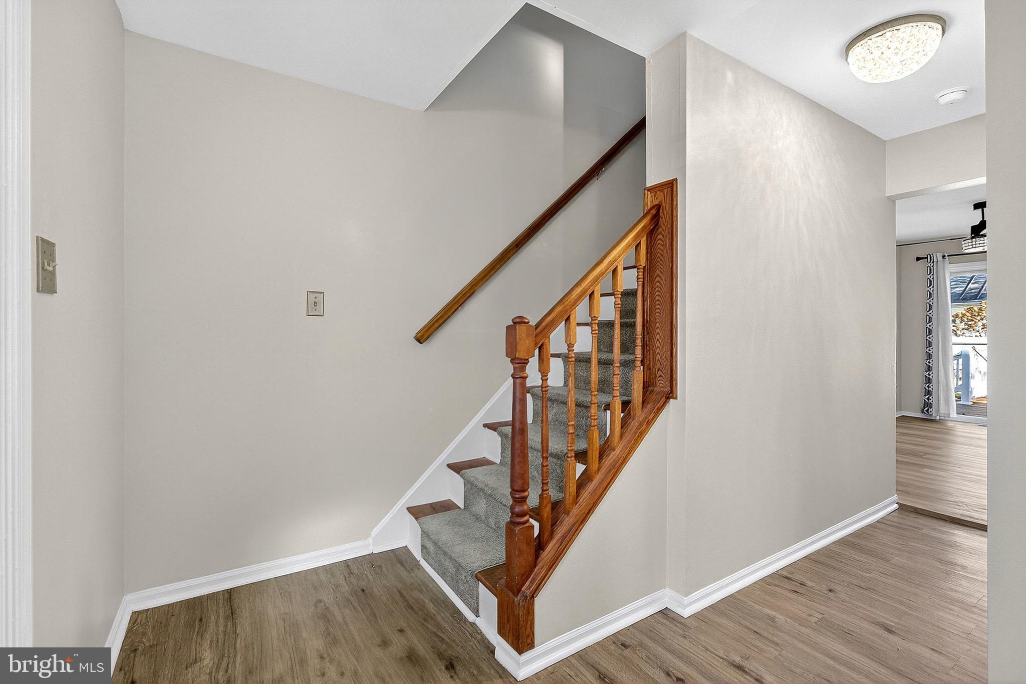 221 Romeo Drive New Castle, DE 19720 - Photo 7 of 38 a view of entryway with wooden floor