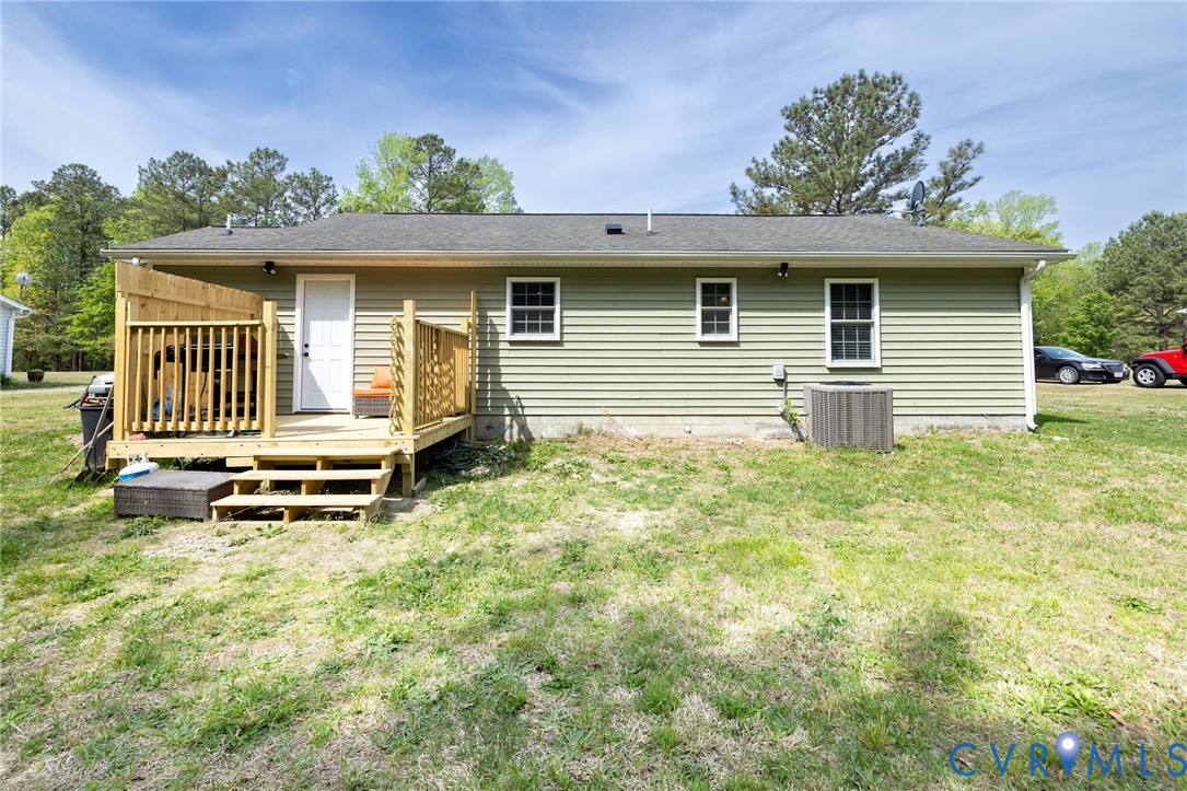 460 Horseshoe Road Jarratt, VA 23867 - Photo 22 of 24 a backyard of a house with barbeque oven