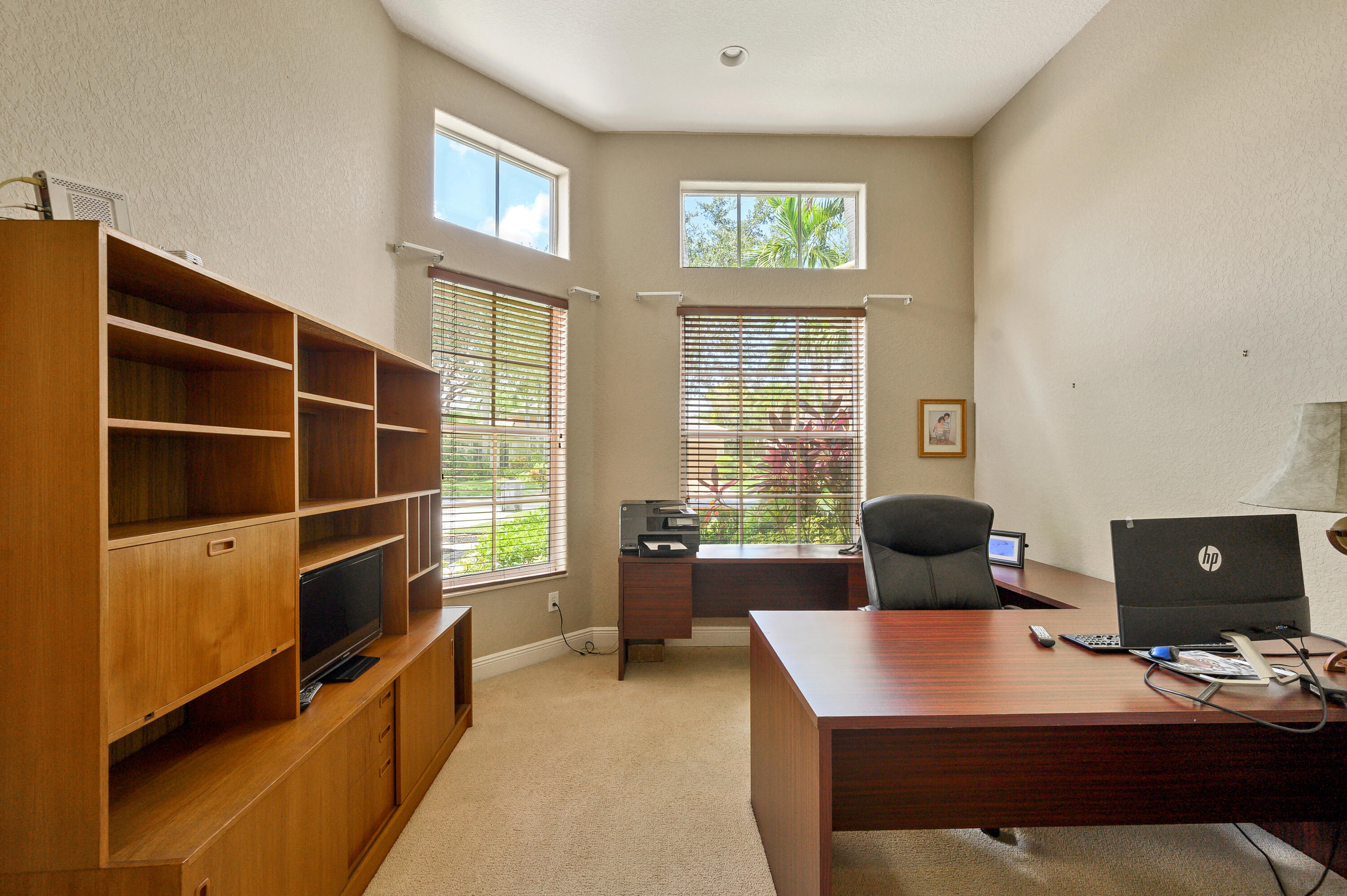 11840 Bayfield Drive Boca Raton, FL 33498 - Photo 17 of 28 a room with furniture and a window