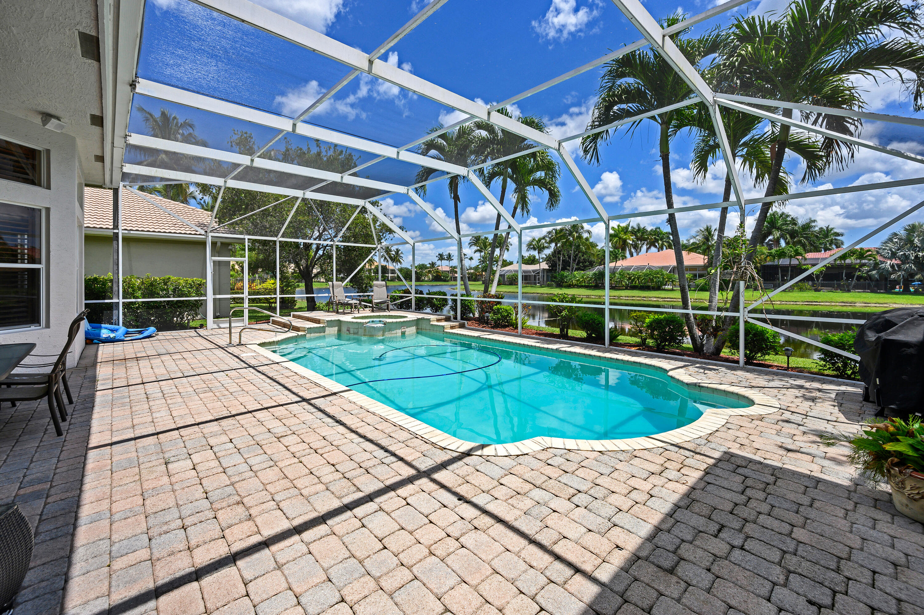 11840 Bayfield Drive Boca Raton, FL 33498 - Photo 4 of 28 a view of a backyard with sitting area