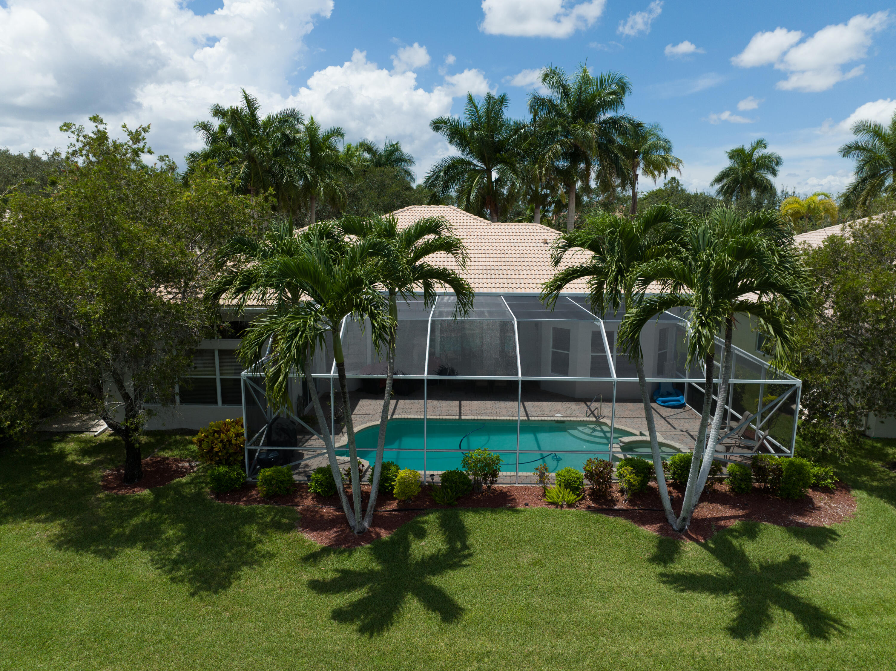 11840 Bayfield Drive Boca Raton, FL 33498 - Photo 5 of 28 a garden view with a seating space