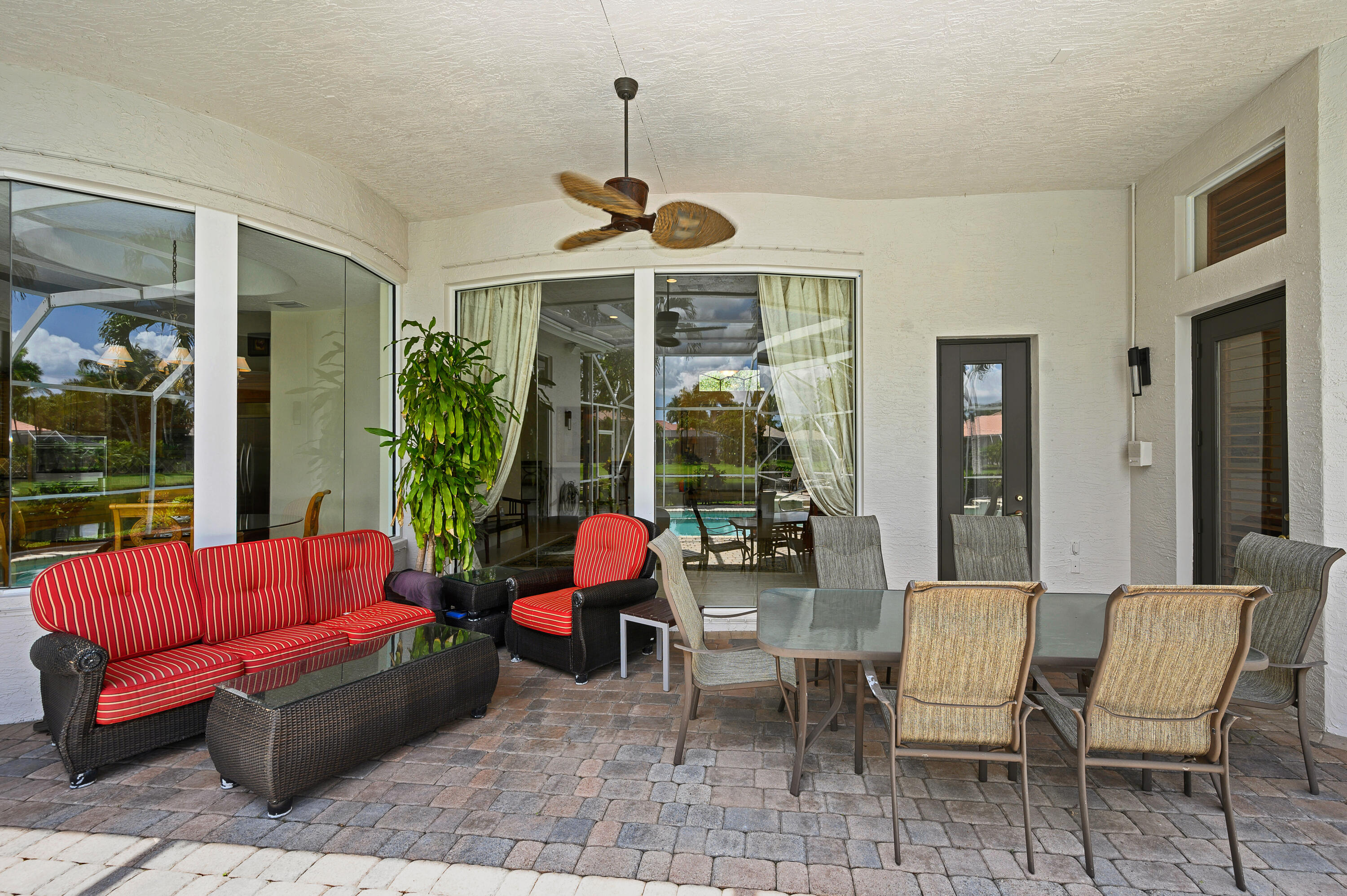 11840 Bayfield Drive Boca Raton, FL 33498 - Photo 6 of 28 a living room with furniture and a large window