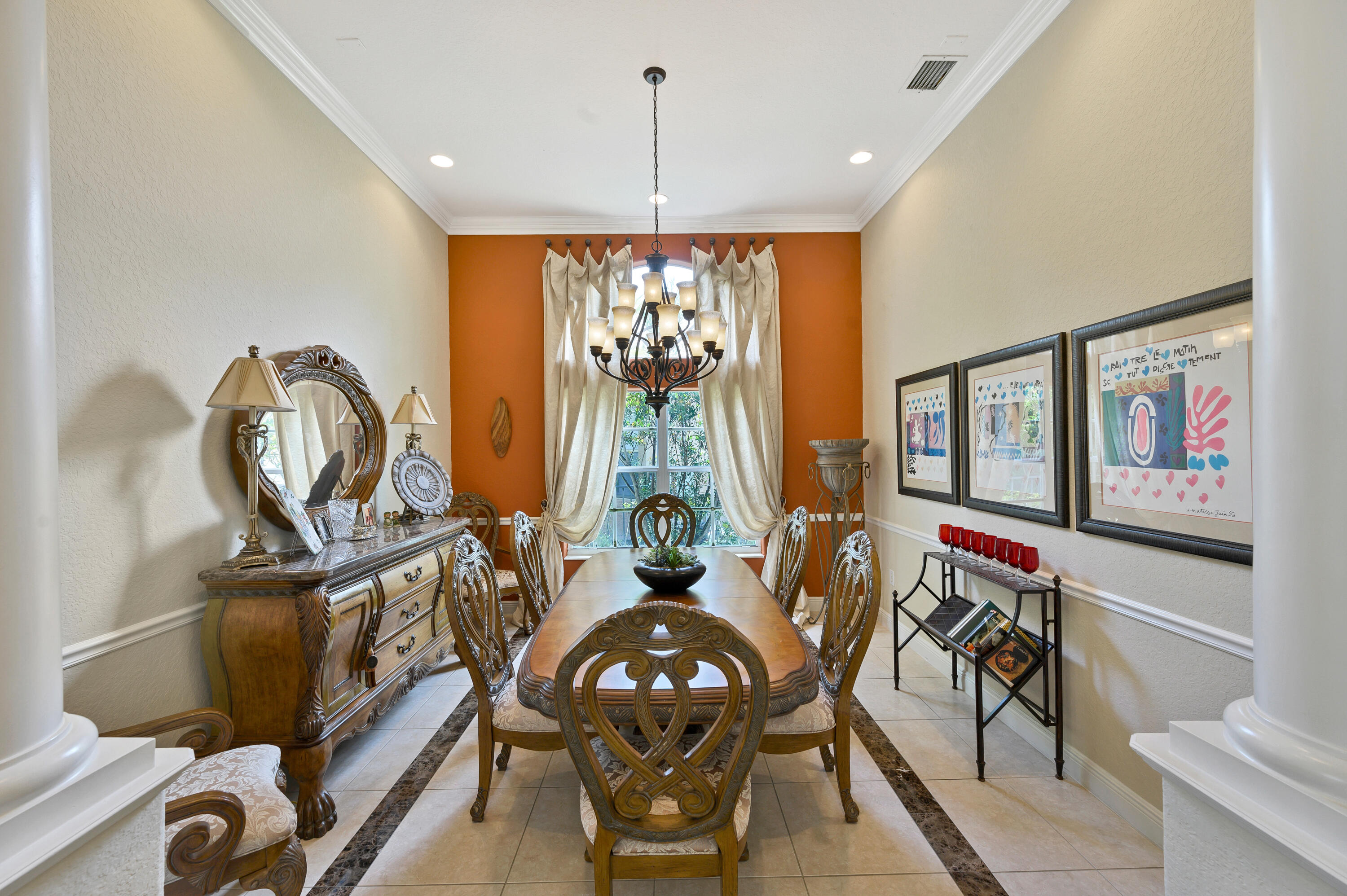 11840 Bayfield Drive Boca Raton, FL 33498 - Photo 10 of 28 a living room with furniture chandelier and a large window