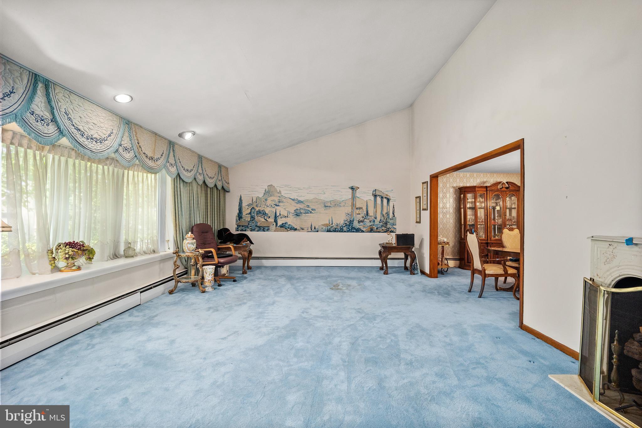 417 Gribbel Road Wyncote, PA 19095 - Photo 9 of 44 a view of game room with window and couch