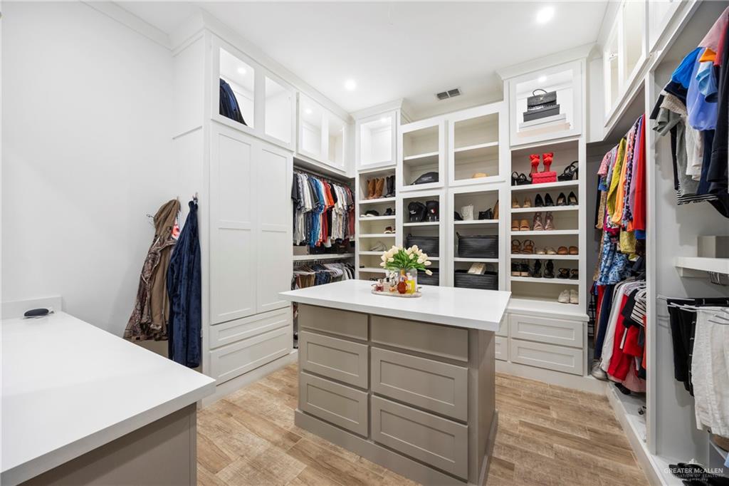 2860 North Fm 2360 Rio Grande City, TX 78582 - Photo 12 of 32 a view of walk in closet with clothes and shoes