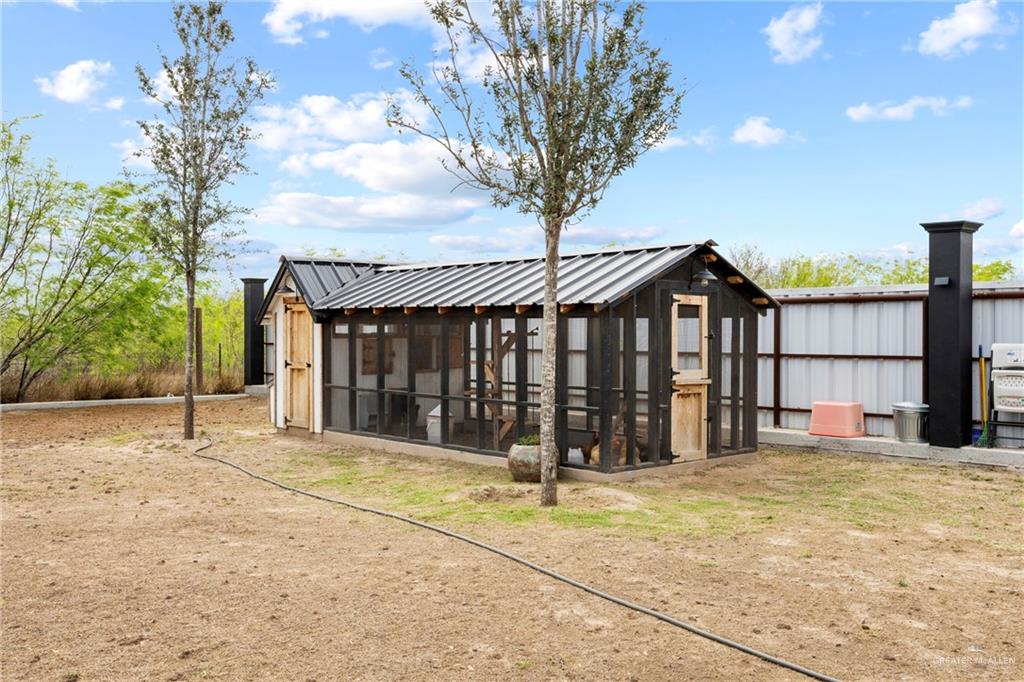 2860 North Fm 2360 Rio Grande City, TX 78582 - Photo 25 of 32 a view of a house with a yard and porch