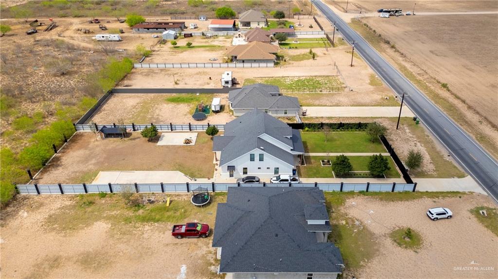 2860 North Fm 2360 Rio Grande City, TX 78582 - Photo 29 of 32 an aerial view of a house with a swimming pool