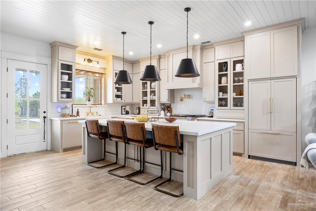 2860 North Fm 2360 Rio Grande City, TX 78582 - Photo 3 of 32 a kitchen with a sink stove and refrigerator