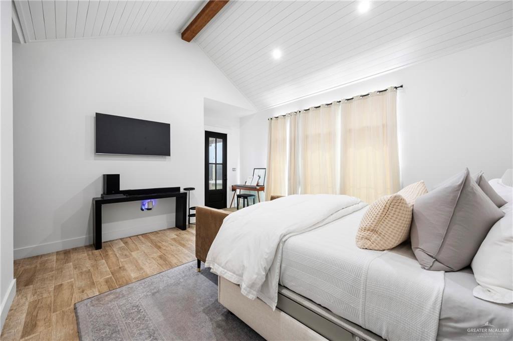 2860 North Fm 2360 Rio Grande City, TX 78582 - Photo 10 of 32 a bedroom with a bed and a flat screen tv