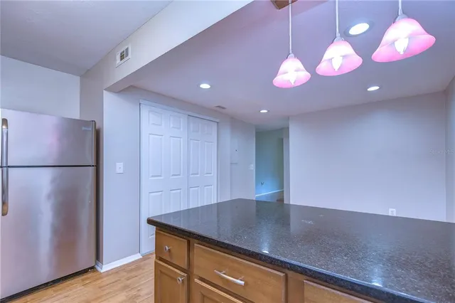 a view of kitchen and front door