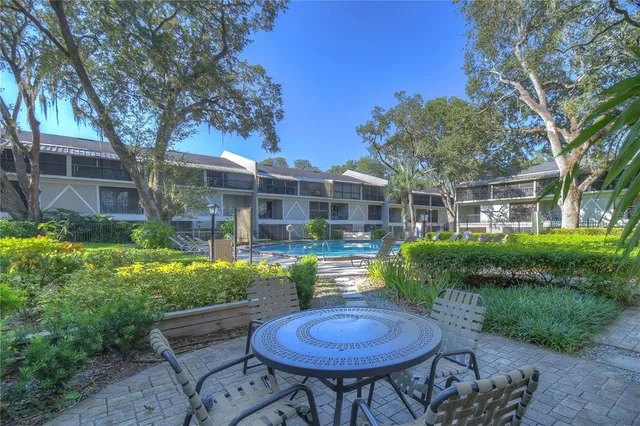 a view of swimming pool from a balcony
