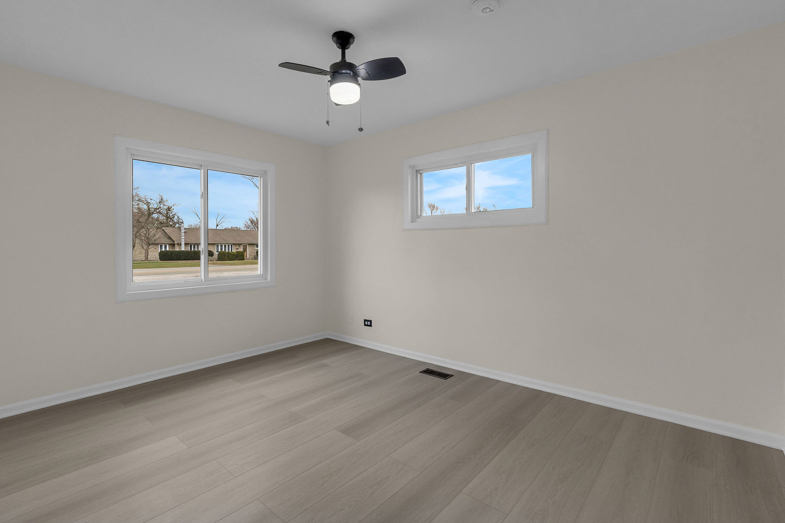 1190 Ash Road Hoffman Estates, IL 60169 - Photo 11 of 27 a view of empty room with windows
