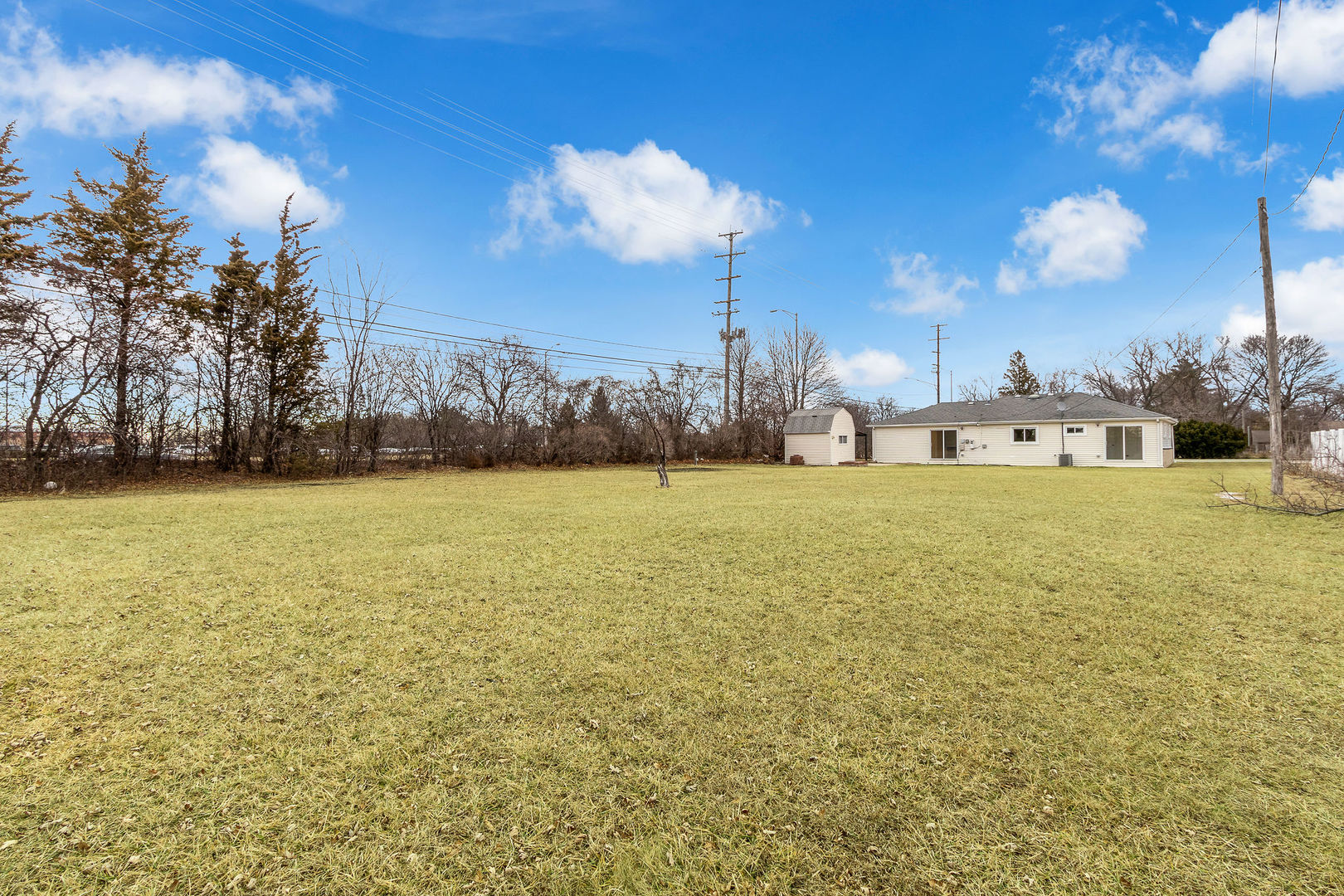 1190 Ash Road Hoffman Estates, IL 60169 - Photo 24 of 27 a view of a lake with a yard